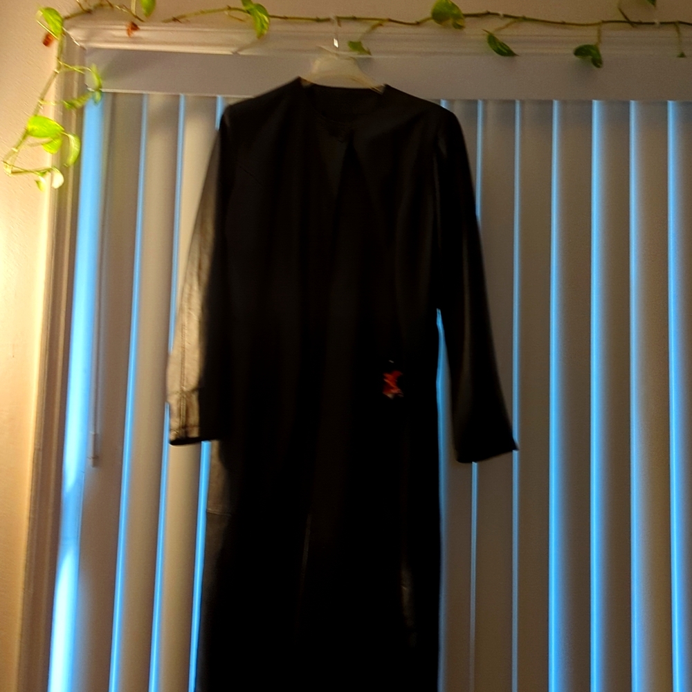 Full length Real Leather Coat. Never worn.